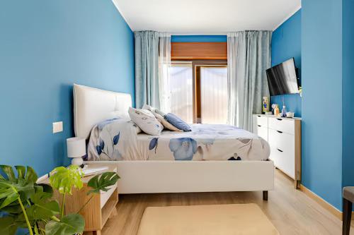 Ένα ή περισσότερα κρεβάτια σε δωμάτιο στο Pied-à-terre Casa Caterina