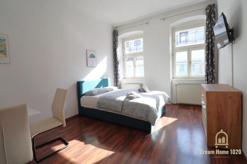 Ένα ή περισσότερα κρεβάτια σε δωμάτιο στο Cream Home