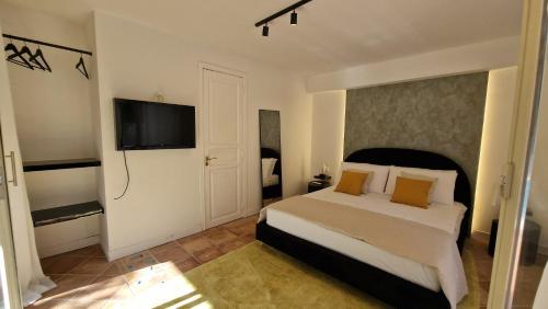 Ένα ή περισσότερα κρεβάτια σε δωμάτιο στο Villa Domus Dea Mondello