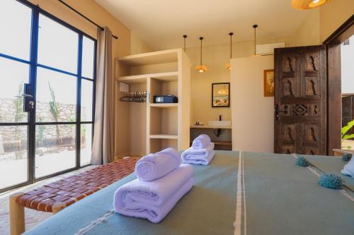 Ένα ή περισσότερα κρεβάτια σε δωμάτιο στο Riad Le Mogador