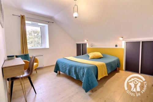 Ένα ή περισσότερα κρεβάτια σε δωμάτιο στο La rosalie