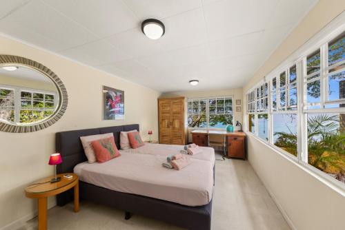 Postel nebo postele na pokoji v ubytování Villa Seaside Boca Sami