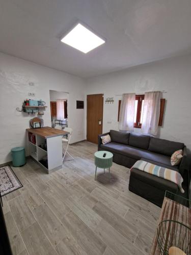 Ein Sitzbereich in der Unterkunft La Herbolera Vv Apartamento