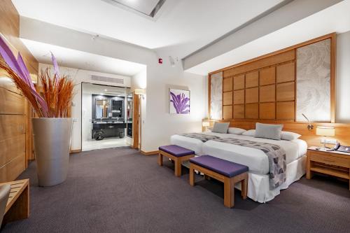 Postel nebo postele na pokoji v ubytování Riu Plaza Panamá