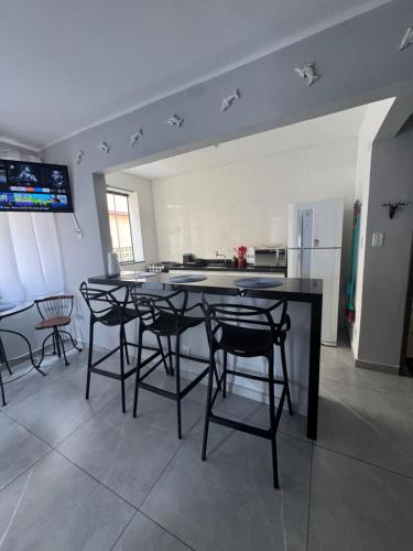 Kuchyň nebo kuchyňský kout v ubytování Ap Aconchego 210 B