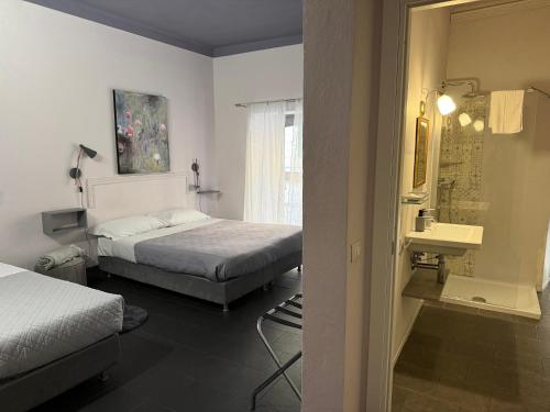 Ένα μπάνιο στο Holidays Rooms Rattazzi
