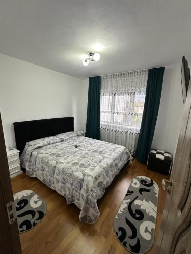 Postel nebo postele na pokoji v ubytování Apartament