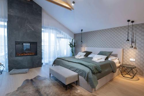 Postel nebo postele na pokoji v ubytování Apartmanica Chalet 5B private wellness, garage, Donovaly