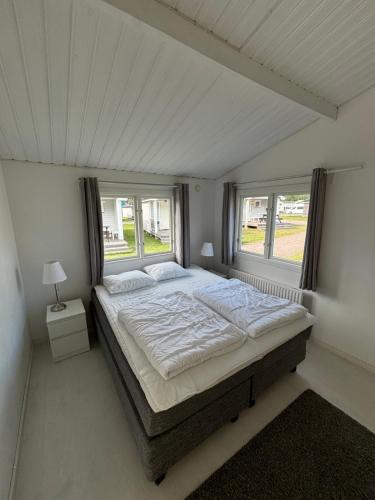 Postel nebo postele na pokoji v ubytování Falsterbo Camping Resort