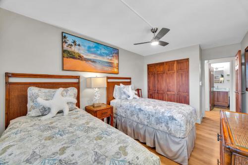 Ένα ή περισσότερα κρεβάτια σε δωμάτιο στο Maui Sunset B319: Ocean view 2BR condo in North Kihei, perfect for families.