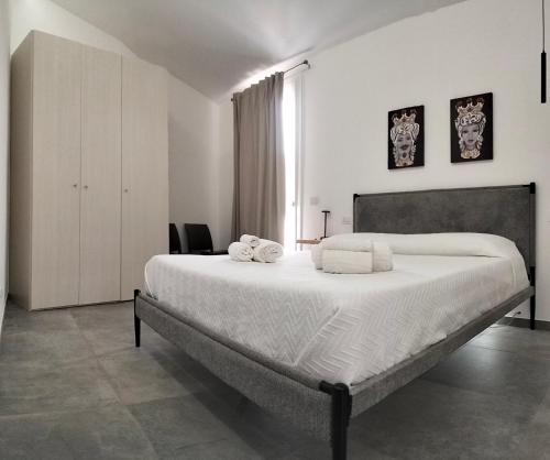 Postel nebo postele na pokoji v ubytování Le maree di Cofano