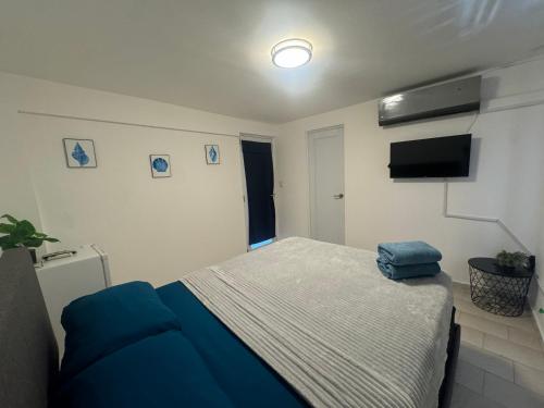 Ένα ή περισσότερα κρεβάτια σε δωμάτιο στο Down Town Hotel