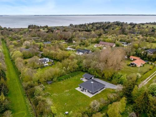 an aerial view of a house with a large yard at Holiday Home Veijo - 400m to the fjord by Interhome in Spottrup
