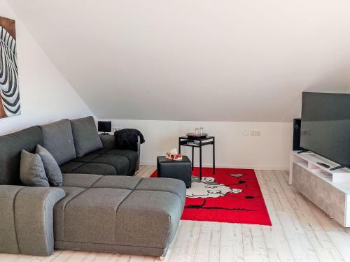 TV a/nebo společenská místnost v ubytování Holiday Home Lindenstraße-3 by Interhome