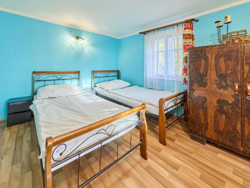 Postel nebo postele na pokoji v ubytování Holiday Home Chalupa u Tety Bystré by Interhome