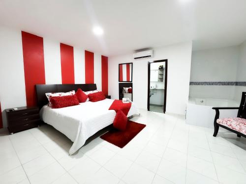 Ένα ή περισσότερα κρεβάτια σε δωμάτιο στο Hotel la Ciudad