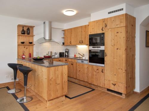 Η κουζίνα ή μικρή κουζίνα στο Apartment Les Combins 30 by Interhome