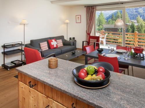 a bowl of fruit on a counter in a living room at Apartment Les Combins 30 by Interhome in Champex