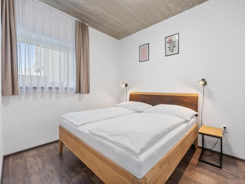 Postel nebo postele na pokoji v ubytování Apartment Costa Plana by Interhome