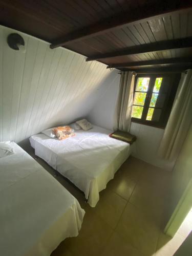 Postel nebo postele na pokoji v ubytování Chale Hostel Do Indio