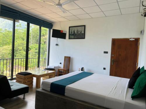 Postel nebo postele na pokoji v ubytování Palabaddala Tea and Eco Lodge