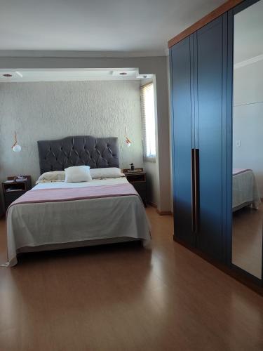 Ένα ή περισσότερα κρεβάτια σε δωμάτιο στο Casa Por do Sol