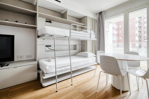 Postel nebo postele na pokoji v ubytování Torre Milano Luxury Suite Gym-Pool&Rooftop