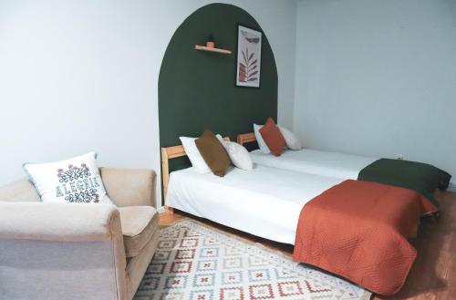 Postel nebo postele na pokoji v ubytování Casa da Lapa Porto