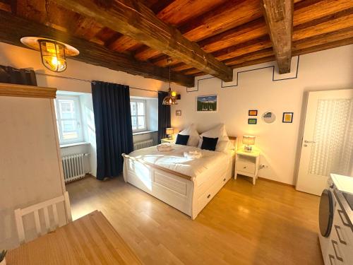 Postel nebo postele na pokoji v ubytování Gemütliches Altstadtjuwel im Herzen Passaus