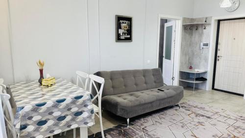 Χώρος καθιστικού στο Красивые апартаменты на ЭКСПО