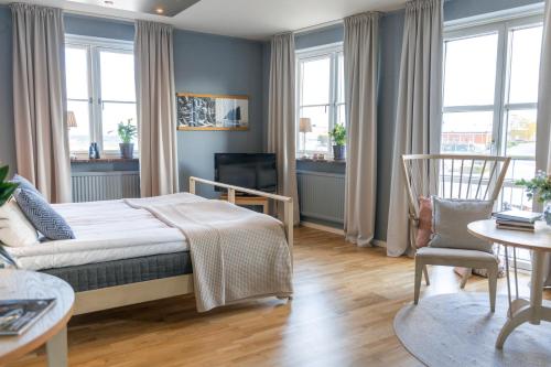 Llit o llits en una habitació de Maritim Hotell & Krog