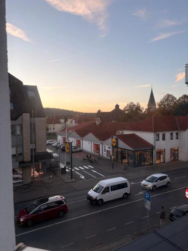 a view of a street with cars parked on the road at La mia Casa in Bielefeld