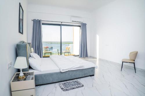 Ένα ή περισσότερα κρεβάτια σε δωμάτιο στο Sweet Apartment