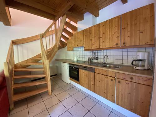 Η κουζίνα ή μικρή κουζίνα στο Natur Ferienpark 11 - Typ B