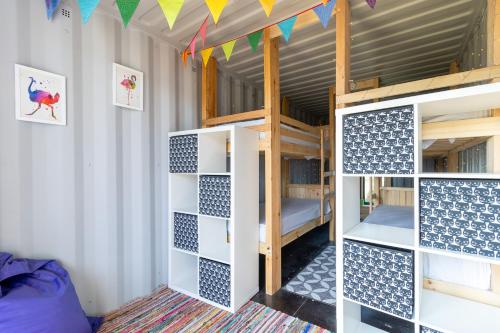 a bunk bed room with two bunk beds at Container 7, Camp Tapnell in Yarmouth