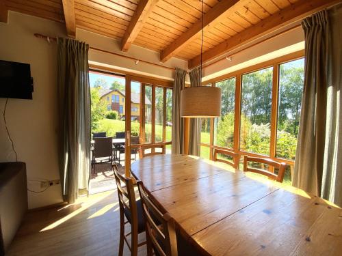 TV a/nebo společenská místnost v ubytování Natur Ferienpark 3 - Ferienhaus Typ C