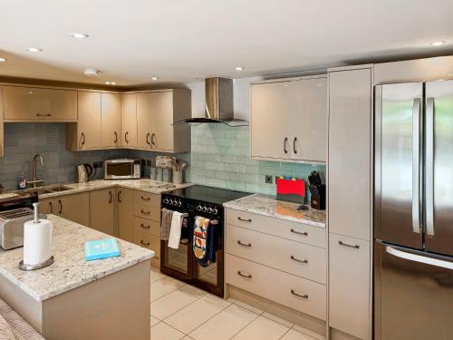 Køkken eller tekøkken på Barn Owl Cottage - Uk48510