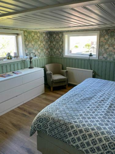 Ένα ή περισσότερα κρεβάτια σε δωμάτιο στο Mountain House Overlooking Rönnäng Archipelago