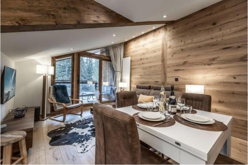 Courchevel 1650 - Charming Penthouse with Stunning Views & Private Parking