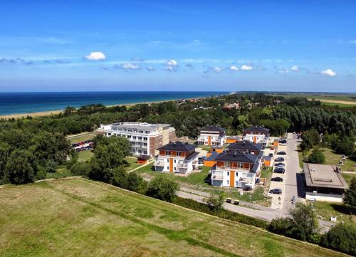 an aerial view of a resort with the ocean at WINDLICHT App Nr 3 max 4 Pers in Dierhagen