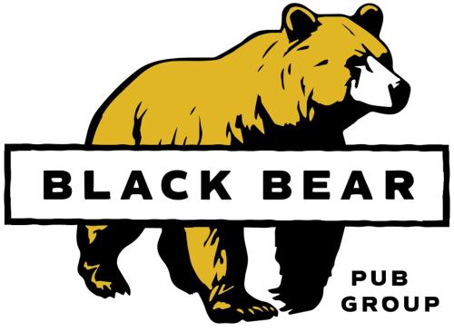 a brown bear holding a sign that reads black bear at Above the Bear in Taunton