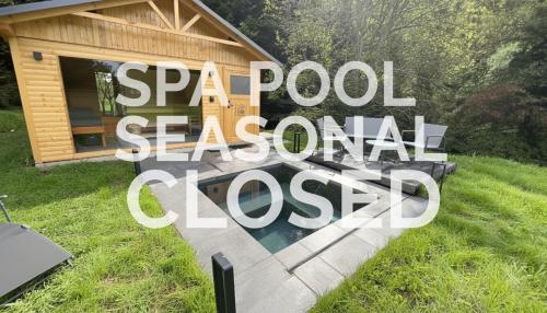 a sign that reads spam pool seasonal closed in front of a house at Cosy getaway in raw nature in Šentjur