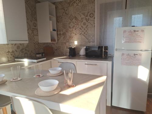 Küche/Küchenzeile in der Unterkunft Casa vacanze Le Rondini