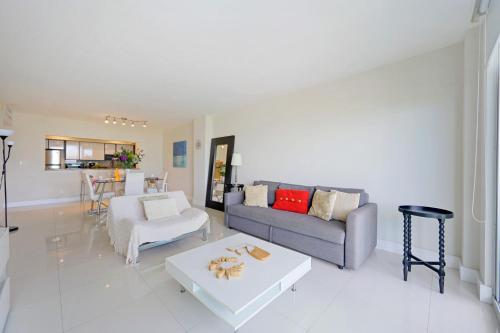 a living room with a couch and a table at Ocean Reserve 1524 in Miami Beach