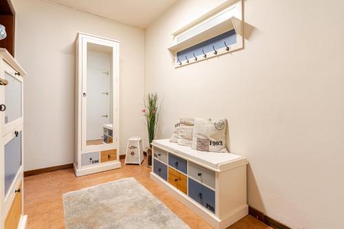 a dressing room with a mirror and a dresser at Puravida 4seasons - Nature Hideaway in Arveaco