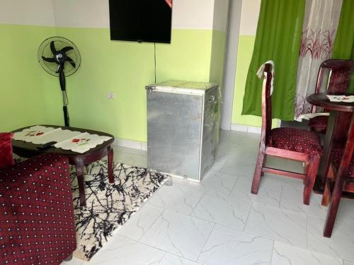 Un televizor și/sau centru de divertisment la Chance junior