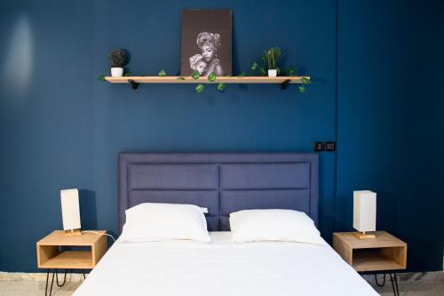 Postel nebo postele na pokoji v ubytování Appartement moderne face au parc la Marsa