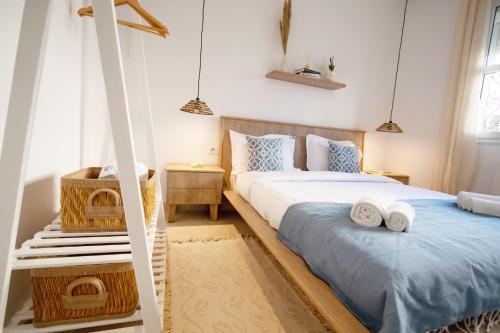 Postel nebo postele na pokoji v ubytování Villa bord de mer piscine chauffée et terrasse