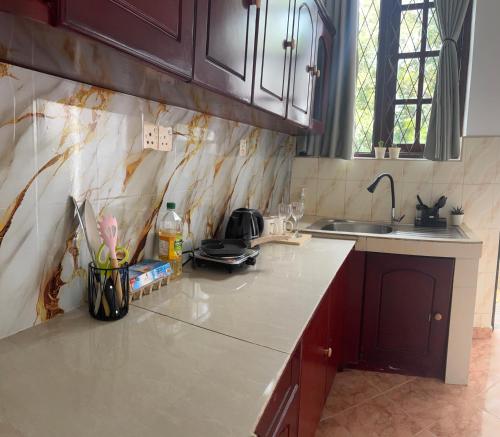 Køkken eller tekøkken på Kandy Villa 119