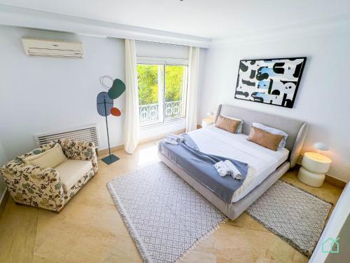 Postel nebo postele na pokoji v ubytování Villa des artistes : Villa de luxe à Carthage